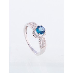 Anillo oro blanco de primera ley 18k con diamantes y topacio azul