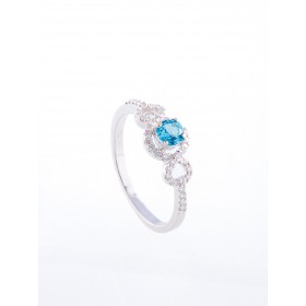 Anillo oro blanco de primera ley 18k con diamantes topacio azul